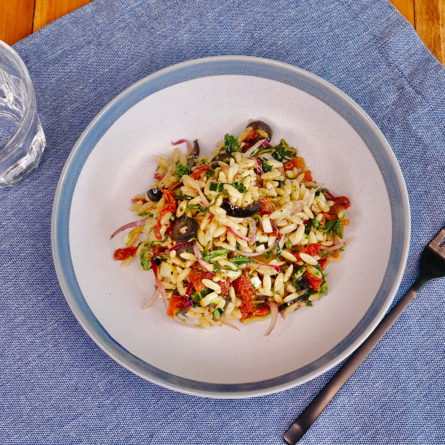 Orzo Salad with Sun-Dried Tomatoes, Black Olives and Zucchini